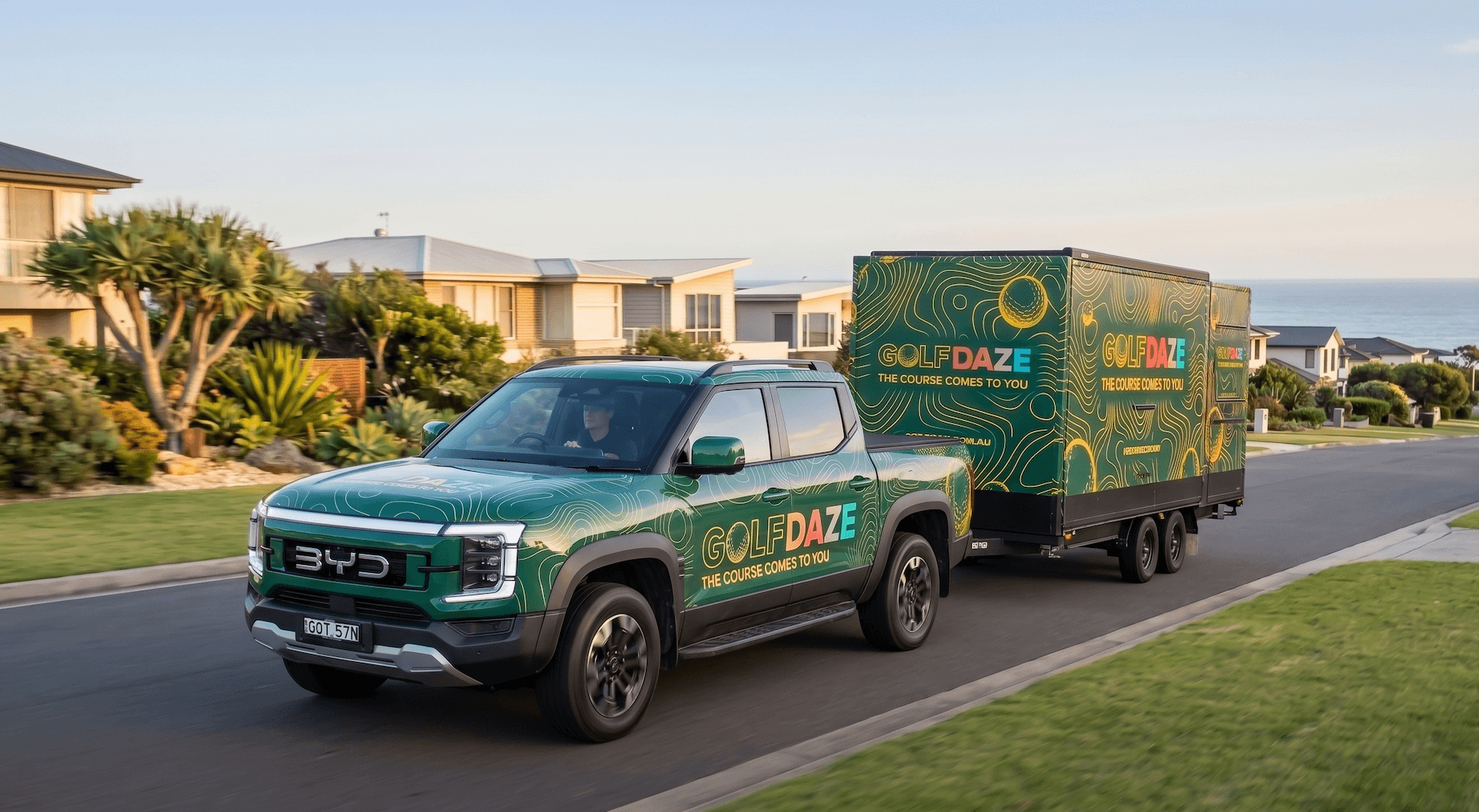 A Golf Daze franchise caravan on the road — the mobile golf simulator business in transit